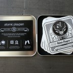 _0001_atomic_playpen_coasters_metal_case_inside _0001_atomic_playpen_coasters_metal_case_inside